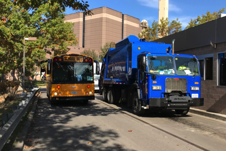 Trash truck and school bus