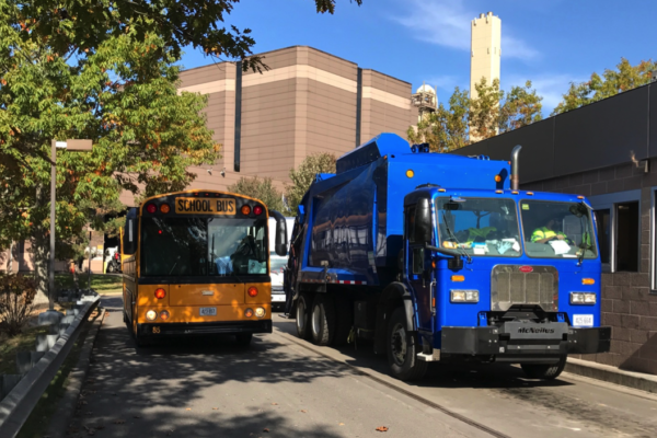 Trash truck and school bus